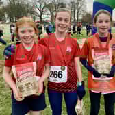 Moira Primary School pupils Sarah Holland in 2nd place, Rachel Holland in 1st place and Alanna Matthews from Christian Brothers’ Primary School, Armagh in 3rd place in the second girls’ race at the second round of the 2023-2024 Flahavan’s Athletics NI Primary School Cross Country League which took place at Lurgan Park.  Pic credit: Morrow Communications