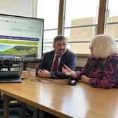 From left: Professor Sir Michael McBride, Chief Medical Officer; Robin Swann, Health Minister, and Dr Patricia Donnelly OBE, Chair of the NI Bereavement Network, discuss the new Bereavement NI website. Photo submitted by the Department of Health