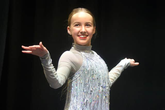 Maria Hassan finishes her dance with a flourish at Portadown Dance Festival in Portadown Town Hall on Monday. PT17-250.