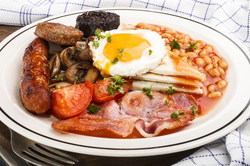 Considered by many to be the ultimate breakfast food, there’s a reason why this constantly tops polls for Northern Ireland’s favourite dish. 
On one level, the fry includes sausage, bacon, and eggs - very much like its English counterpart - but subverts expectations for non-Northern Irish consumers by including black and white pudding, grilled tomato, beans, soda bread, and potato bread.
Despite cooked breakfasts dating back to at least the Victorian era, the Ulster Fry owes its popularity to the tourism boom of the 1960s. 
Significantly, the fry must not, under any circumstances, contain anything that cannot be fried in bacon fat, and debate continues to rage over the components needed for a perfect fry