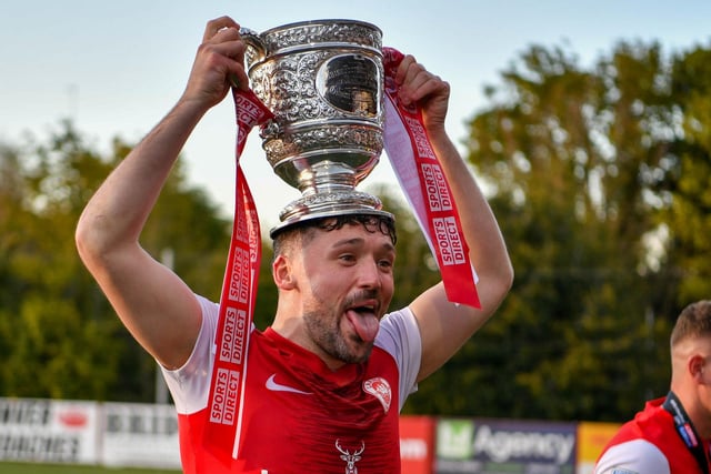 Tomas Cosgrove of Larne enjoying the celebrations.