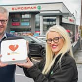 Paul Patterson, Store Manager and Community Representative, Ashlee Gribbin from Eurospar Moundview in Dromore are pictured with the newly installed Automated External Defibrillator at the Hillsborough Road store.
