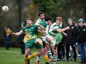 Midfield action from Ballyholland FC and Newry Celtic at Olympic Park on Saturday Picture: Brendan Monaghan BM14