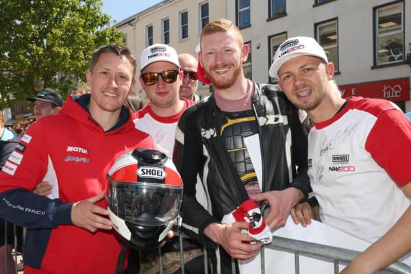 Honda Racing's Dean Harrison chats with Jamie Lee Leonard and brothers Taylor and Lewis Cauley at the Briggs Equipment North West 200 'Meet the Stars' event in Coleraine town centre on Friday.