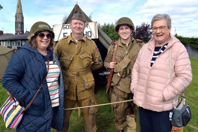 Hazel Douglas, left, and Kathleen Douglas pictured with '82nd Airborne troops' James Duffin and Adam Quinn at the WWII Fun Day on Saturday. LM39-201.