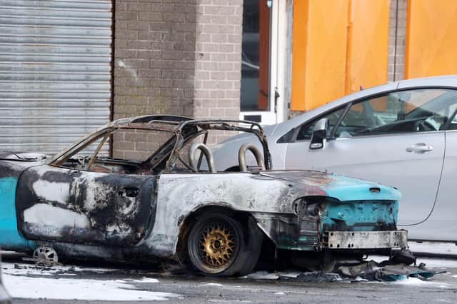 The scene at a car dealership in Newtownards, Co. Down, where police are investigating an arson attack. Picture by Jonathan Porter/PressEye