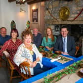 At Dobbins Inn are Laura Cowan, MEA strategic tourism and regeneration manager; the Mayor, Alderman Gerardine Mulvenna; David Roberts, director of strategic development at Tourism NI; Kirsty Fallis, Dobbins Inn Hotel and tour guides George McGrand and Adrian Hack. Photo submitted by Mid and East Antrim Council