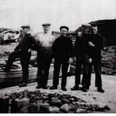 Fishermen at Dunseverick, featured within the Exhibition and submitted by Jim Wilkinson. Credit Jim Wilkinson