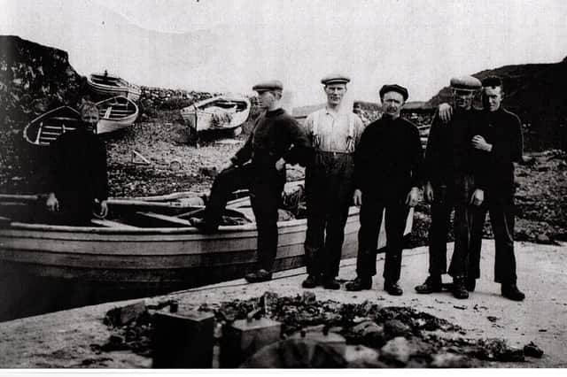 Fishermen at Dunseverick, featured within the Exhibition and submitted by Jim Wilkinson. Credit Jim Wilkinson