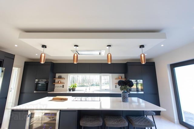 The stylish kitchen has centre island with powerpoints and is ideal for casual dining.