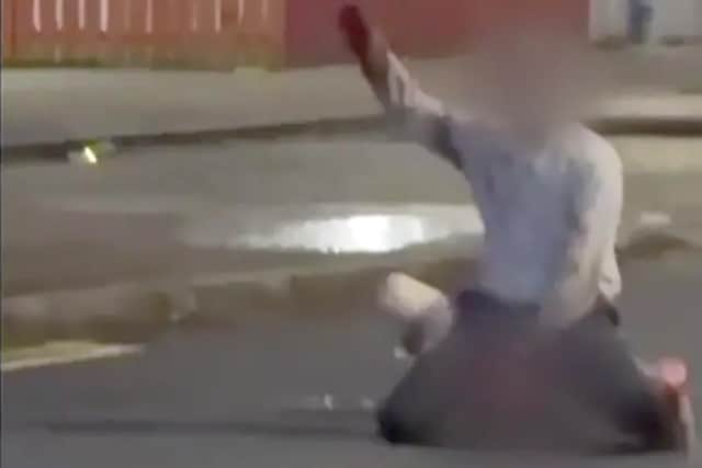 Image taken from an online video showing a man who has been arrested on suspicion of attempted murder after the knife attack in north Belfast. Picture: Pacemaker