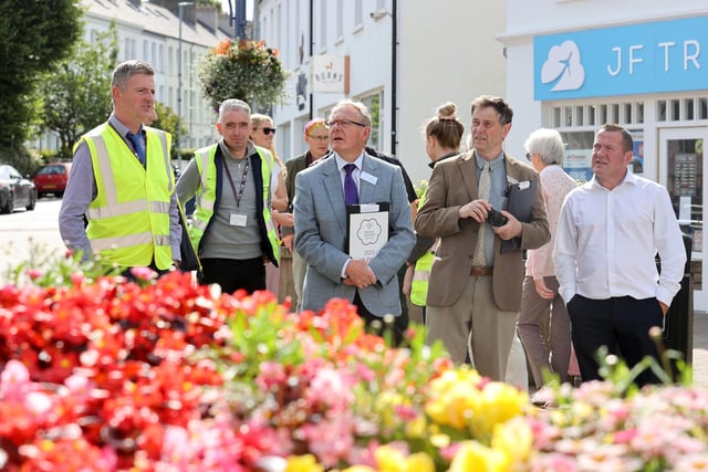 Noel Davoren, Council’s Estates Manager joins some of his team and Britain in Bloom judges Rae Beckwith and Roger Burnett as they review Coleraine’s displays.