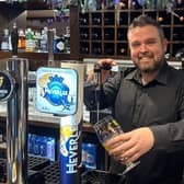 Ciaran Devlin behind the bar at the Castledawson Inn. Picture: Castledawson Inn