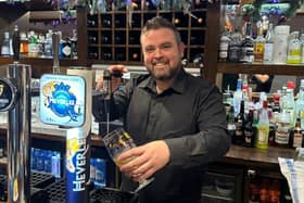 Ciaran Devlin behind the bar at the Castledawson Inn. Picture: Castledawson Inn