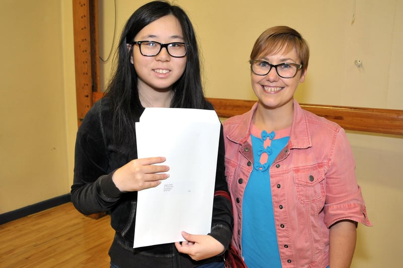 Downshire student Angela Chen with her teacher, Mrs Magill on results day 2018.  Angela obtained 10 top grades in her GCSEs. INCT 34-212-AM