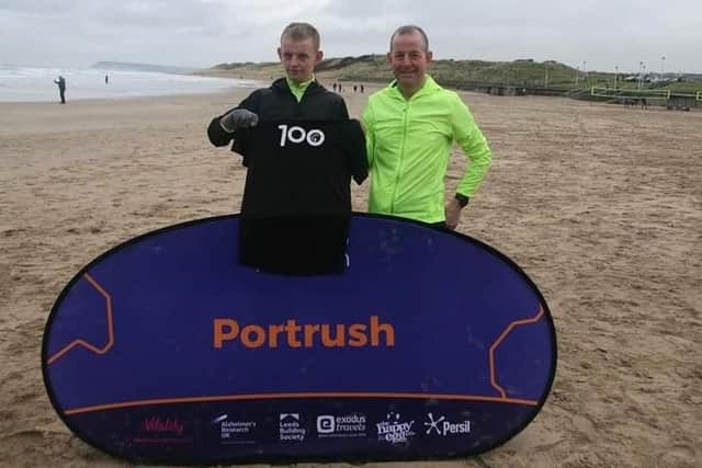 Rhys Walker celebrating his 100th parkrun with his father Maurice Walker