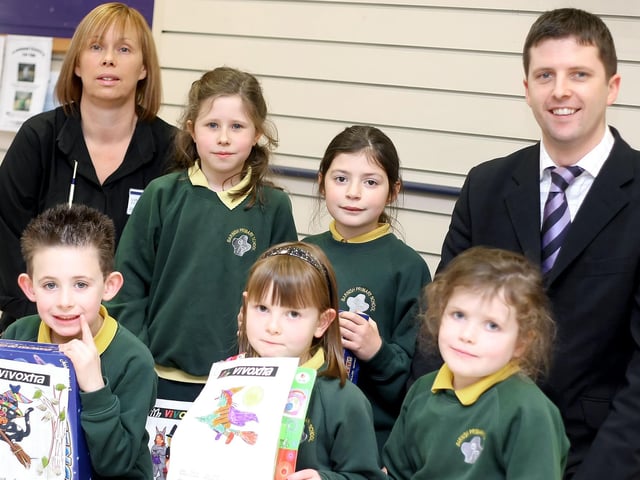 Pupils from Barnish PS pictured with their prizes from a 2009 Halloween Colouring Competition held by Vivoxtra, Ballycastle. Included are Store Manager Jonathan Mitchell and Assistant Manager Lynne Mitchell.