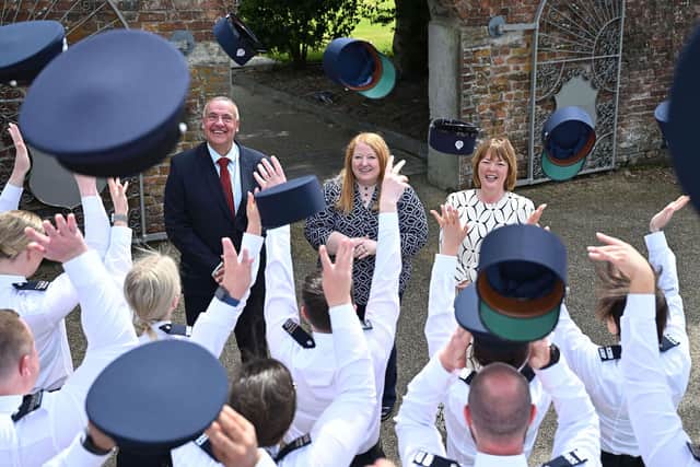 Justice Minister Naomi Long attended a passing out ceremony for 68 new officers who have joined the Northern Ireland Prison Service. Celebrating with the new recruits also are David Kennedy, Director of Prisons, and Beverley Wall, Director General of the Northern Ireland Prison Service. Pic credit: Michael Cooper