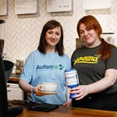 Therese Wilson (Corporate Fundraising Manager, Autism NI) and Brittany Cooper (Barista Ground Espresso Bars) toast to their new charity partnership.