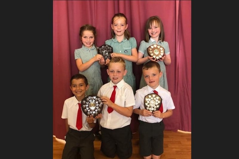 Pictured are prize-winners from P3 at Donacloney Primary School near Lurgan, Co Armagh. Back Row: Mayah Sole, Edith Tumilty, Eva Dornan. Front Row: Fabian Mocanu, Daniel Arnold, Oliver Ward.