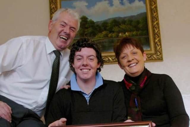 Rory McIlroy pictured at home in Holywood with Dad, Gerry and Mum Rosie. Picture Charles McQuillan/Pacemaker. 26/2/2012 Rory plays in the final of the accenture World Match play. If he wins the tournament he becomes World Number 1.