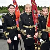 Standard bearers of Kilcluney Volunteers Flute Band, Markethill, pictured before the Mullabrack Accordion Band 40th anniversary parade. Included are from left, Zara Johnston, Rosir Carson, Samantha Milligan and Laura Livingstone. Picture: Tony Hendron