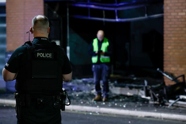 Police at the scene of the fire at the Halifax bank premises in Portadown on Tuesday night.