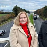 Alliance Party representatives David Honeyford MLA, the party’s Infrastructure spokesperson, and Lisburn and Castlereagh Councillor Gretta Thompson have called for upgrades to the A1 to move forward. Pic credit: Alliance Party