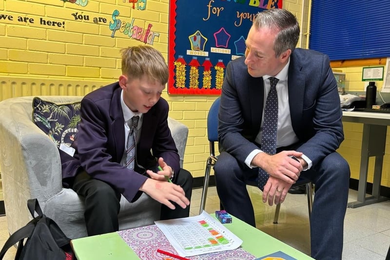 Education Minister Paul Givan in conversation with a pupil during his visit to Carrickfergus Academy.