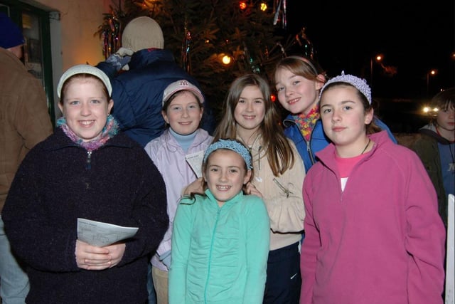 Joining in the singing around the Glenarm Christmas tree in 2006. LT50-386-PR