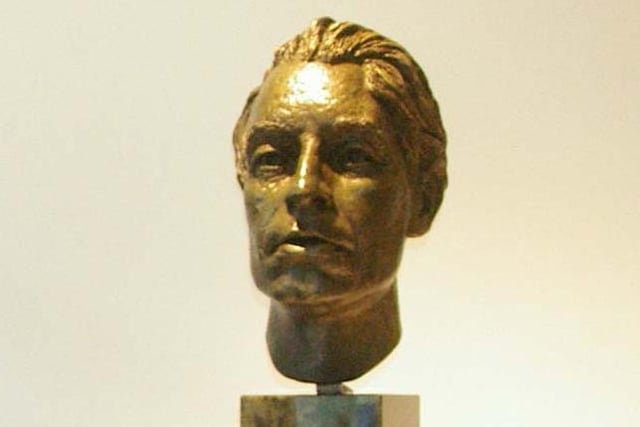 Born in Belfast, Louis MacNeice grew up the son of an Anglican clergyman in Carrick. He later wrote about his childhood in the town in the poem, ‘Carrickfergus’.  MacNeice is commemorated with a plaque on North Road in the town, an area where he lived as a child.  Meanwhile, this bronze bust of the poet went on display at Carrick Museum in 2007 to mark the centenary of his birth.