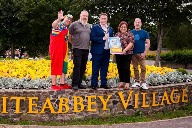 Mayor of Antrim and Newtownabbey, Cllr Mark Cooper is joined by Whiteabbey Business Association Representatives, Derek Kernoghan, Liz Walker and Darren Walker to promote the Whiteabbey Village Fair. (Contributed).