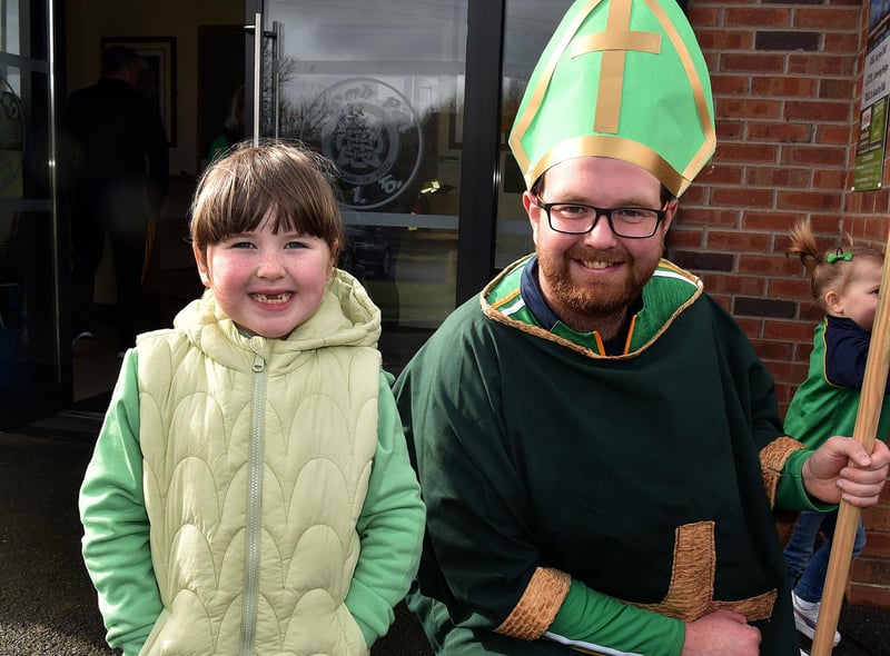 Jessica McConville (6) poses proudly with St Patrick who was played by Canice McShane for the St Paul's GAC parade. LM12-203.