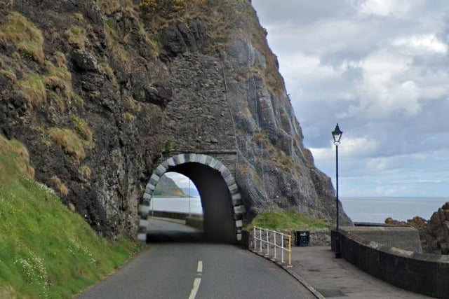 You'd be hard pressed to find a more scenic driving route than the Antrim Coast Road, with its sea views on one side and rugged hillsides and cliffs on the other.  The Black Arch at Larne was one of the many features devised in the 19th century by the road's designer and creator, Scottish engineer William Bald.