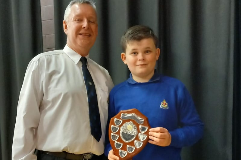 The Dungannon & South Tyrone Council Shield for Best Personality presented to Samuel Gillespie by Mr. Peter McConnell.
