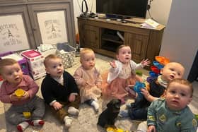 Eva Boucher and friends celebrate her first birthday. Eva is wearing the white cardigan and tutu. Pic credit: SEHSCT