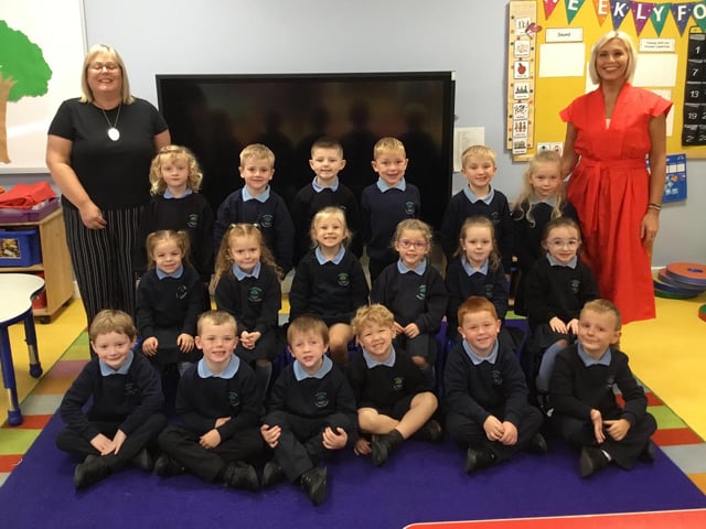 Mrs Nesbitt's P1 class at Tandragee Primary School pictured with Mrs Bennett, classroom assistant.