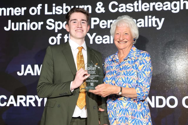 Lady Mary Peters congratulates James Nicholson from Ulidia Carryduff Taekwondo Club on winning the Junior Sports Personality of the Year Award.