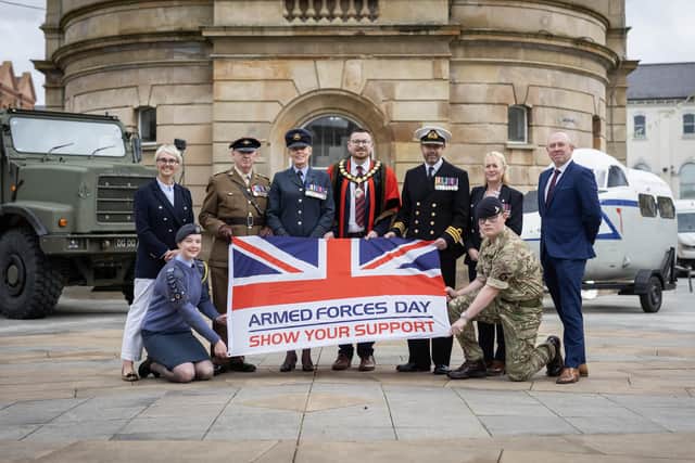 Pictured at the launch of Armed Forces Day 2026 at Coleraine Town Hall; Councillor Tanya Elder, Captain Robert Gibson BEM, Royal Logistic Corps 152 (North Irish) Regiment, Wing Commander Jacqueline Rankin (RAF), Deputy Mayor of Causeway Coast and Glens, Alderman Richard Brown Stewart, Commander Tom Wardley, Senior Naval Officer NI, Councillor Dawn Huggins, Causeway Coast and Glens Borough Council's Veterans' Champion, Councillor Philip Anderson, Deputy Veterans Champion And kneeling, Eirean Hickey RAF Air Cadet, Coleraine Unit 2350 squad and Matthew Thompson, Army Cadet, Coleraine B Company 1st Battalion. Picture: Causeway Coast and Glens Borough Council