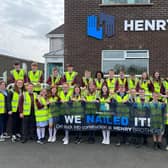 Pictured are pupils and teachers from Wood Primary School at Henry Brothers Careers Day in Magherafelt.