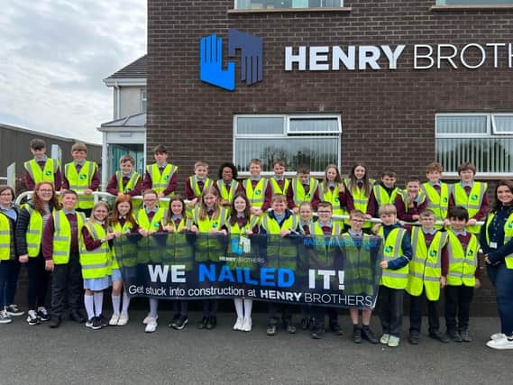 Pictured are pupils and teachers from Wood Primary School at Henry Brothers Careers Day in Magherafelt.