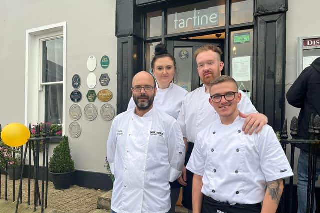 Professional chef lecturer, Colin Wright with former and current Northern Regional College students who played a key role in the preparation and presentation of the successful cookery demonstrations at the Bushmills Whiskey and Salmon Festival. Front row, left to right, Professional Chef lecturer, Colin Wright and former student Tyler Campbell, who completed Levels 2 and 3 Professional Chef courses at the College. Back row, Level 3 Professional Chef student Kerry Neil and Professional Chef and Cookery apprentice, Travis Kane. Credit NRC
