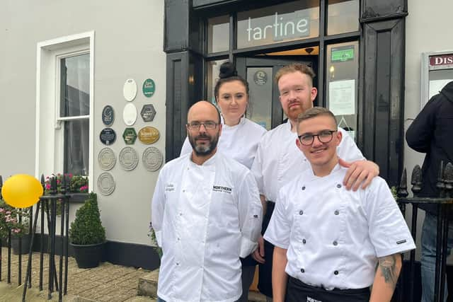 Professional chef lecturer, Colin Wright with former and current Northern Regional College students who played a key role in the preparation and presentation of the successful cookery demonstrations at the Bushmills Whiskey and Salmon Festival. Front row, left to right, Professional Chef lecturer, Colin Wright and former student Tyler Campbell, who completed Levels 2 and 3 Professional Chef courses at the College. Back row, Level 3 Professional Chef student Kerry Neil and Professional Chef and Cookery apprentice, Travis Kane.  Credit NRC