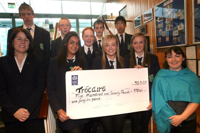Pupils from Fort Hill College presenting a cheque to Susan Morgan (Trocaire Representative) in 2007. The money raised in the school from bun sales during Lent was £570.88. Included in the photograph are (back row) William Sharkey, William Martin, Josh Thompson and Nicky Yau, (front row) Susan Morgan (Trocaire), Sarah Hoppe, Carla Bowyer, Lily Diamond and Samantha McComb