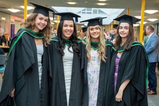 Smiles all round on graduation day at Coleraine on Friday morning.