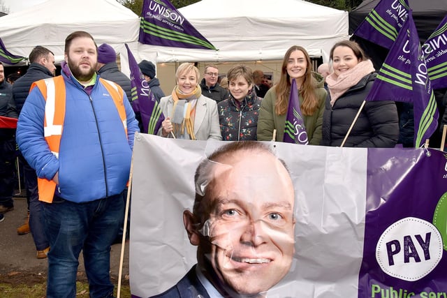 John Creaney, Joint Branch Secretary, UNISON, Craigavon Area Hospital, pictured with striking nursing staff from left, Maureen Devlin, Sarah Rowntree, Megan Reddick and Allison King on the picket line at the hospital. PT05-201.