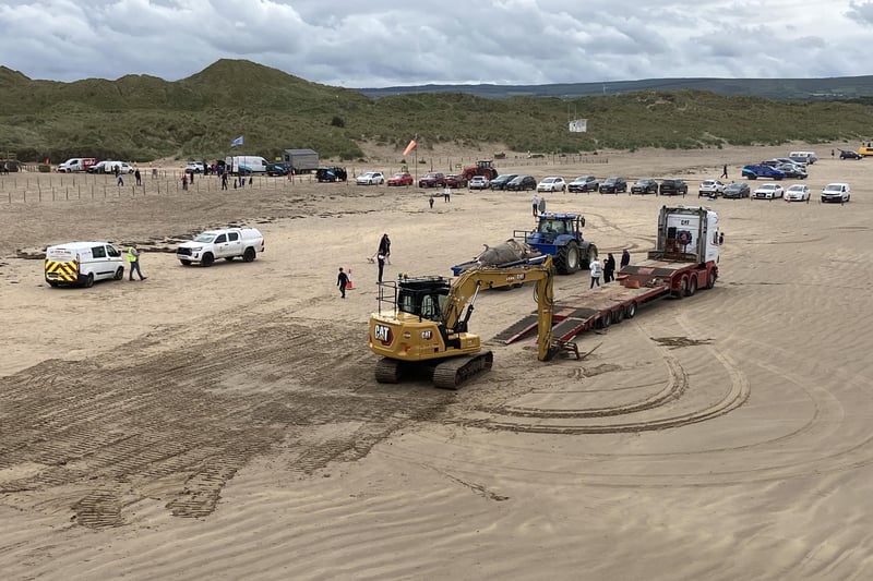 The operation to remove the beached minke whale calf from Portstewart Strand took place on Tuesday, May 27. CREDIT NI WORLD