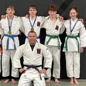 Members of Kyokan Judo Club with head coach Garfield Richarson. CREDIT KYOKAN