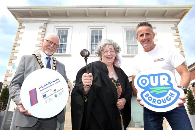 Mayor of Antrim and Newtownabbey, Councillor Henry Cushinan with Kathy Wolff from the Community Relations Forum and Stephen Kelly from C21 Theatre Company.