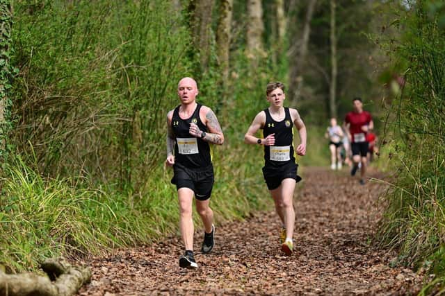 Trev McRoberts and Charlie Wilson battling together in the 5K.